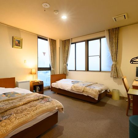 Tabist Business Ryokan Hotel Yukimiso Toyama Station Esterno foto