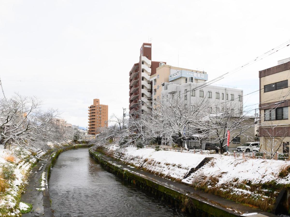 Tabist Business Ryokan Hotel Yukimiso Toyama Station Esterno foto